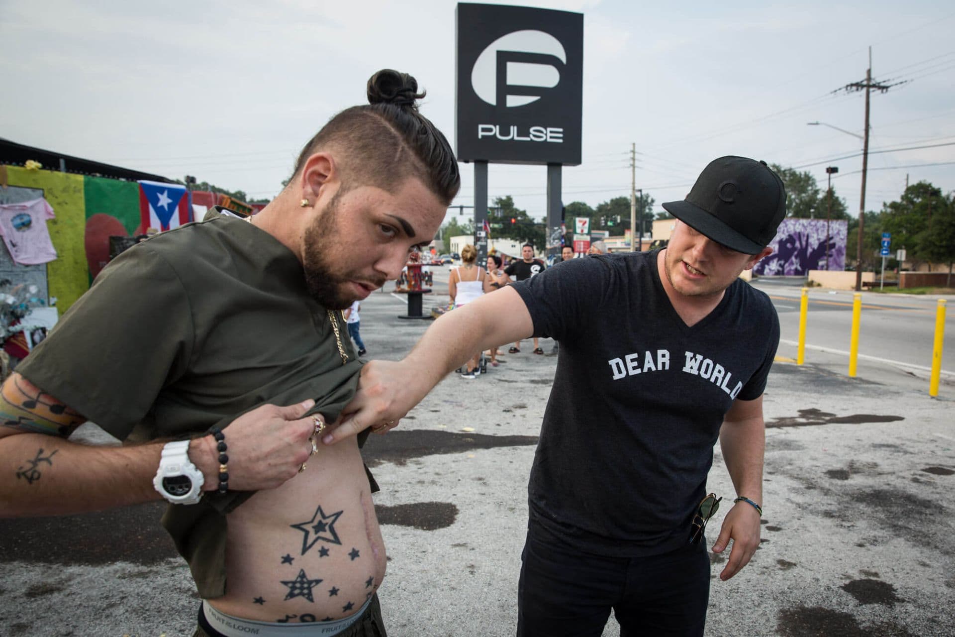 Robert writing messages at the Pulse nightclub memorial